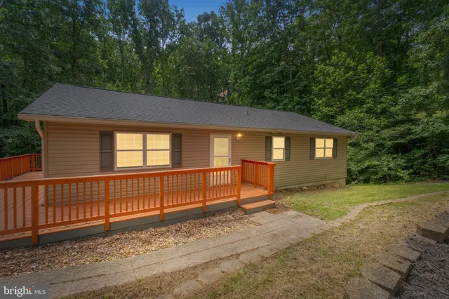 a view of backyard with green space