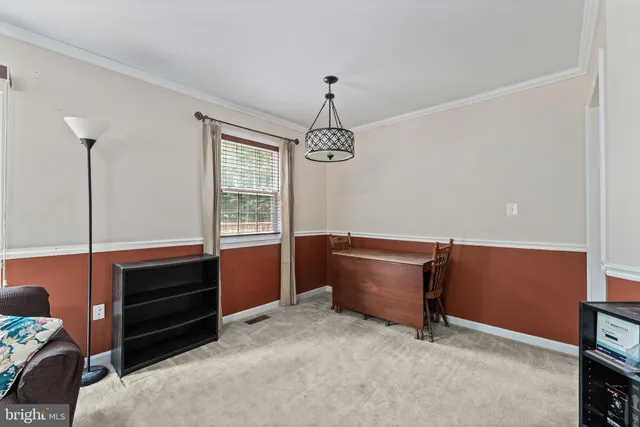 a room with furniture and a window