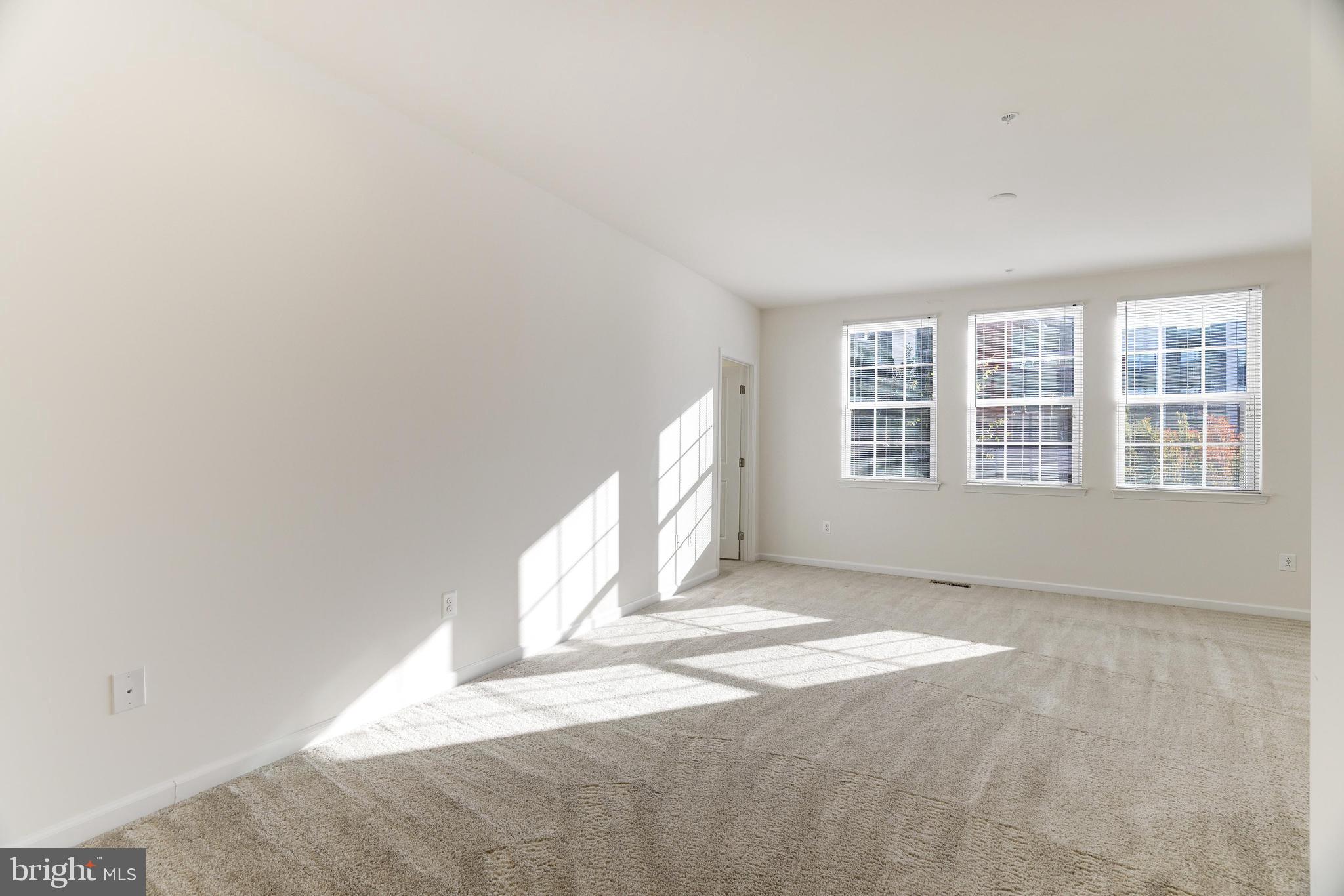 13660 Endeavour Drive, Unit 20C Herndon, VA 20171 - Photo 18 of 35 a view of an empty room with a window