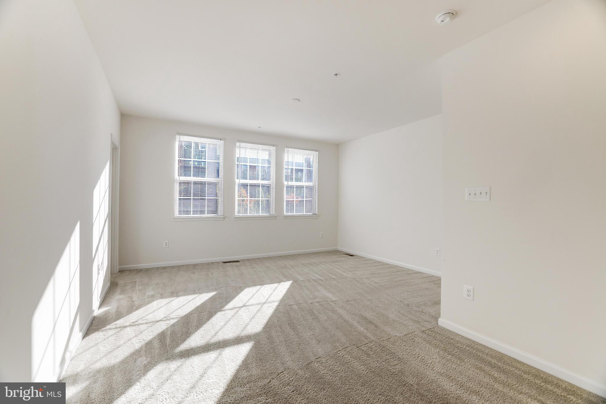 13660 Endeavour Drive, Unit 20C Herndon, VA 20171 - Photo 19 of 35 an empty room with windows