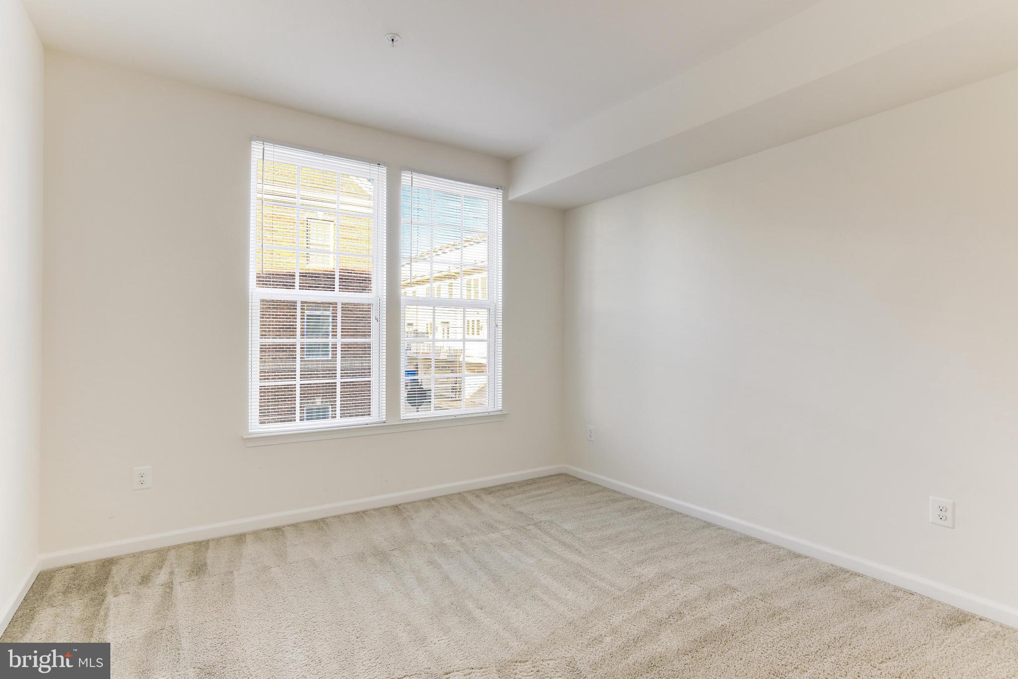13660 Endeavour Drive, Unit 20C Herndon, VA 20171 - Photo 28 of 35 an empty room with a window