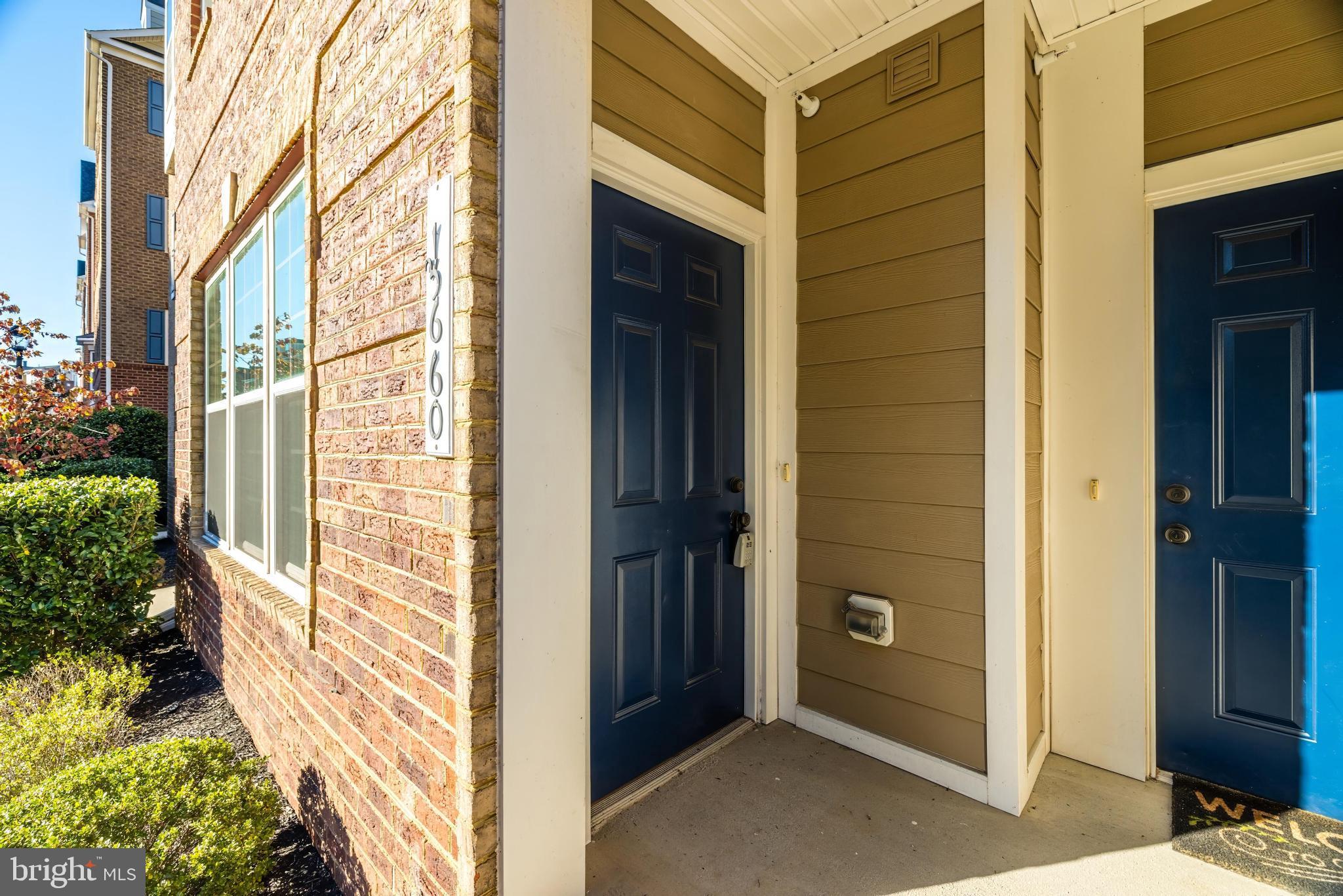 13660 Endeavour Drive, Unit 20C Herndon, VA 20171 - Photo 4 of 35 a view of front door