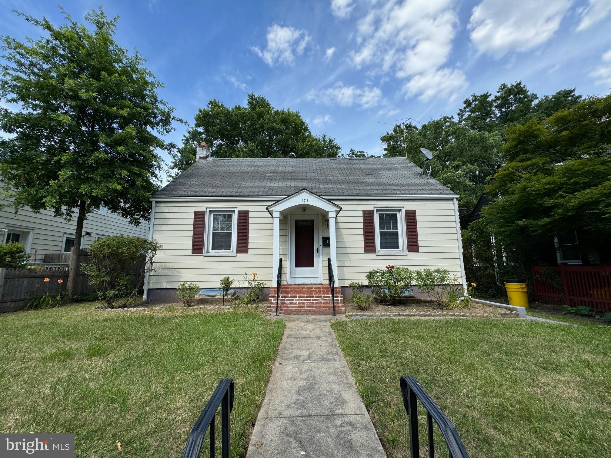 Charming home with inviting curb appeal.