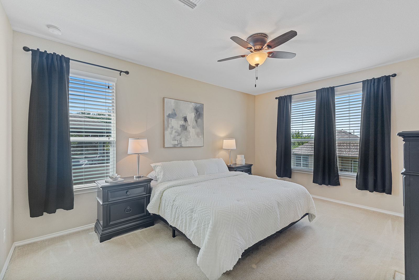 437 Sheepshank Drive Georgetown, TX 78633 - Photo 8 of 22 Relax in comfort with a ceiling fan overhead and sun-filled windows quietly tucked into the rear of the home.