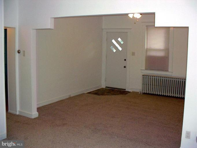 400 Danville Road Baltimore, MD 21206 - Photo 4 of 10 New foyer, paint & carpet...52" ceiling fan