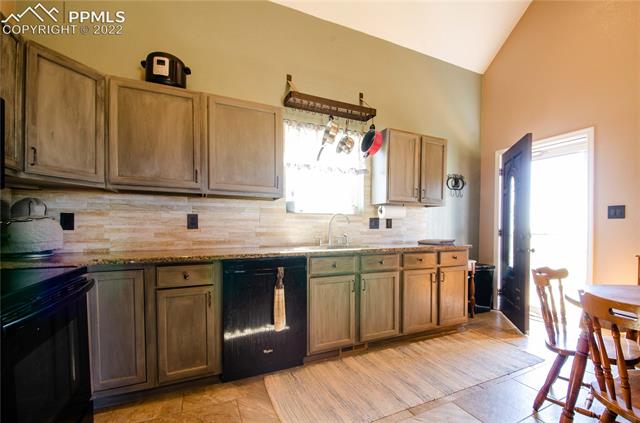 19170 Powers Road Colorado Springs, CO 80928 - Photo 16 of 50 Lots of counter space & cabinets!