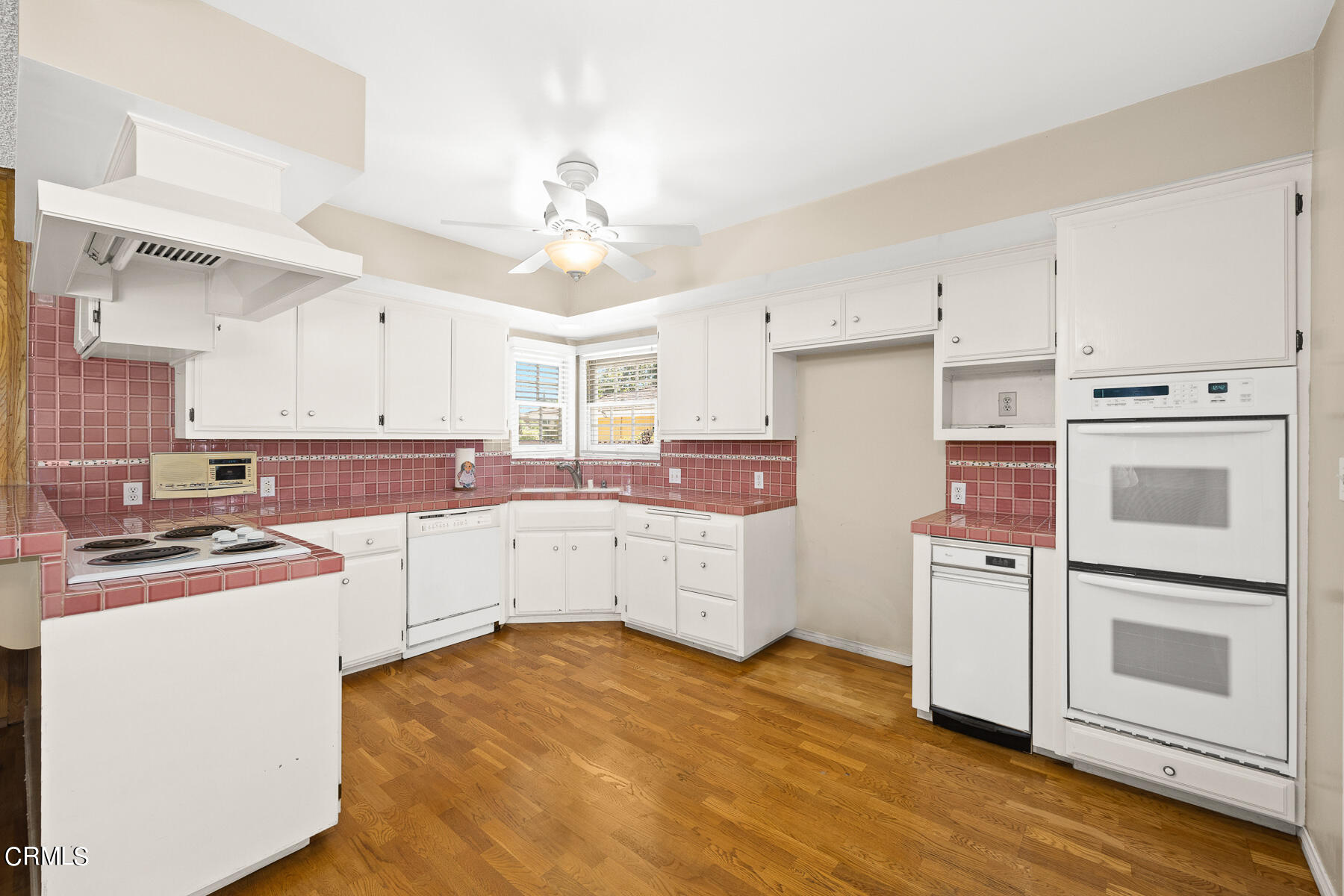 1321 South Eighth Avenue Arcadia, CA 91006 - Photo 11 of 47 a kitchen with stainless steel appliances a stove refrigerator sink and cabinets