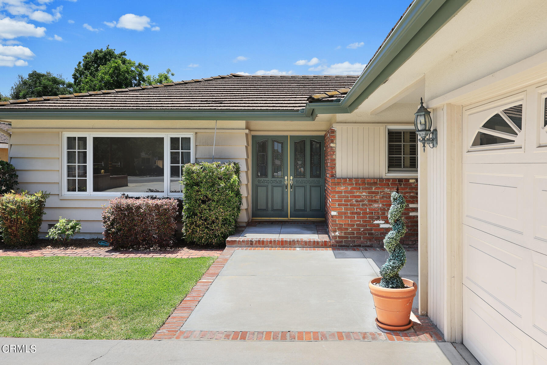 1321 South Eighth Avenue Arcadia, CA 91006 - Photo 2 of 47 a front view of a house with a yard