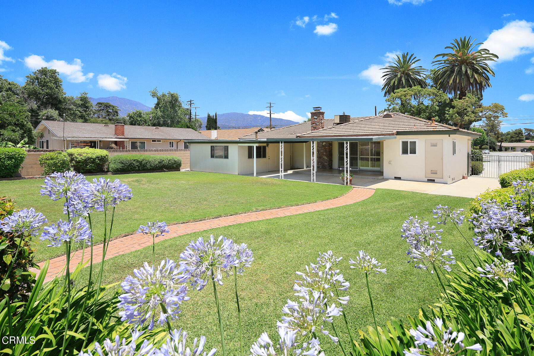 1321 South Eighth Avenue Arcadia, CA 91006 - Photo 32 of 47 a front view of a house with a garden and yard