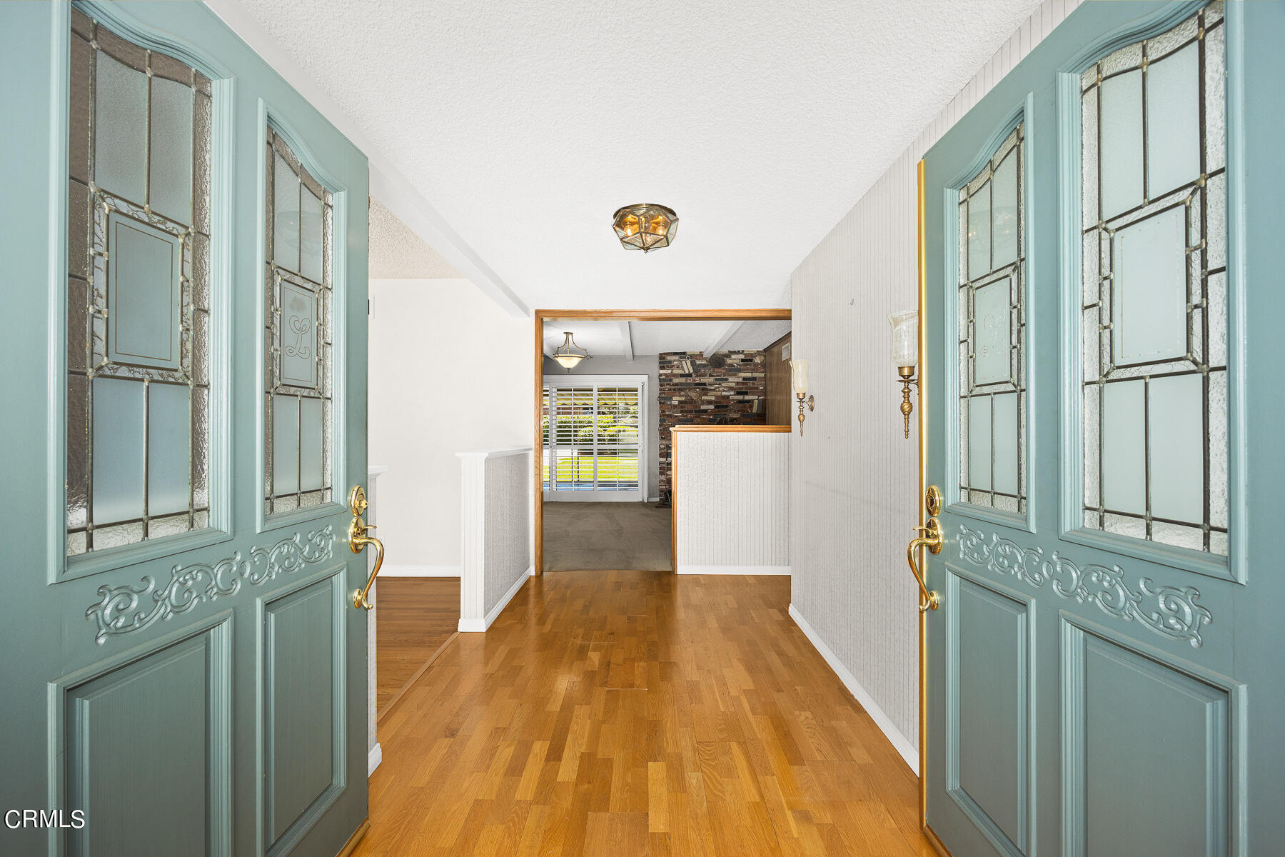 1321 South Eighth Avenue Arcadia, CA 91006 - Photo 4 of 47 a view of a hallway with wooden floor and staircase