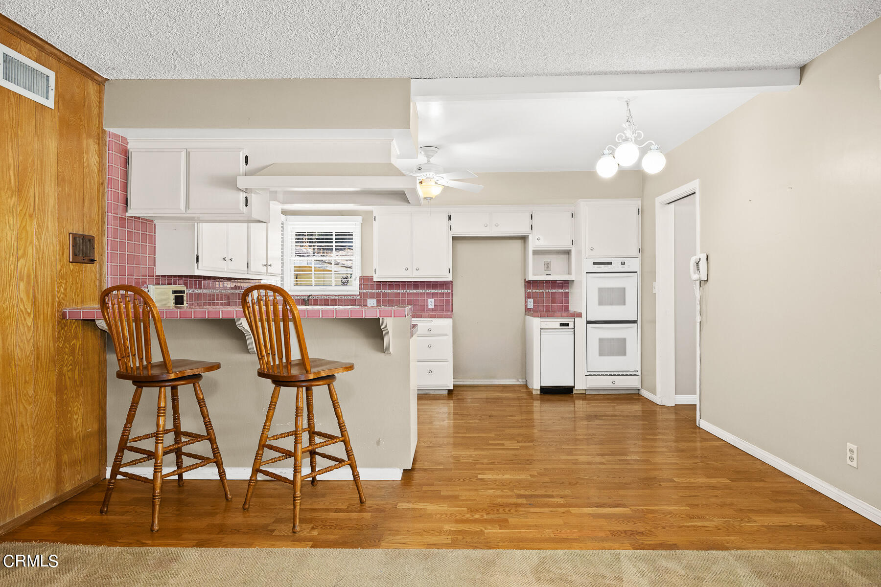 1321 South Eighth Avenue Arcadia, CA 91006 - Photo 10 of 47 a living room with kitchen view and appliances