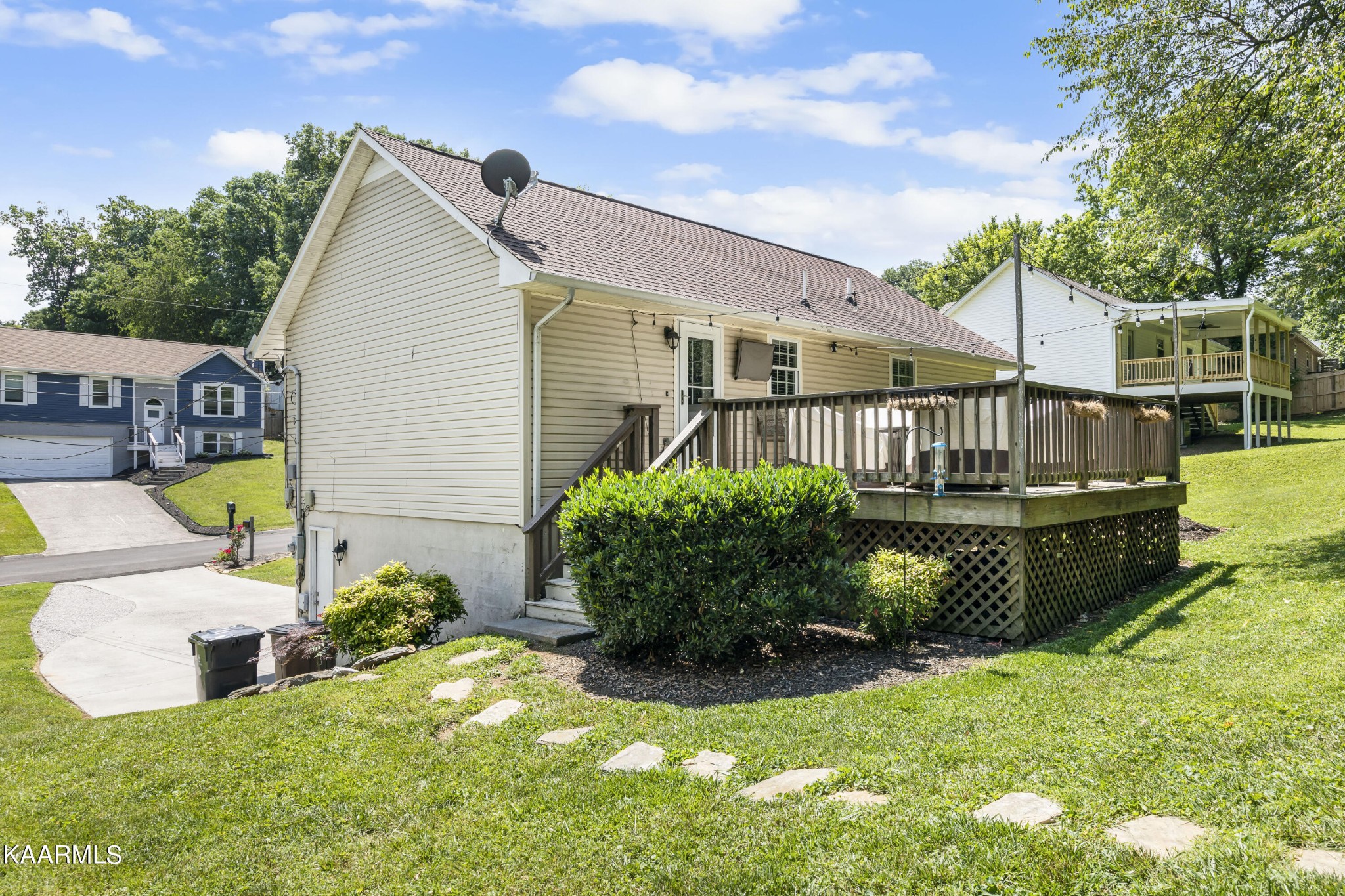 3909 Abercorn Road Knoxville, TN 37921 - Photo 2 of 18 a view of a house with backyard and sitting area