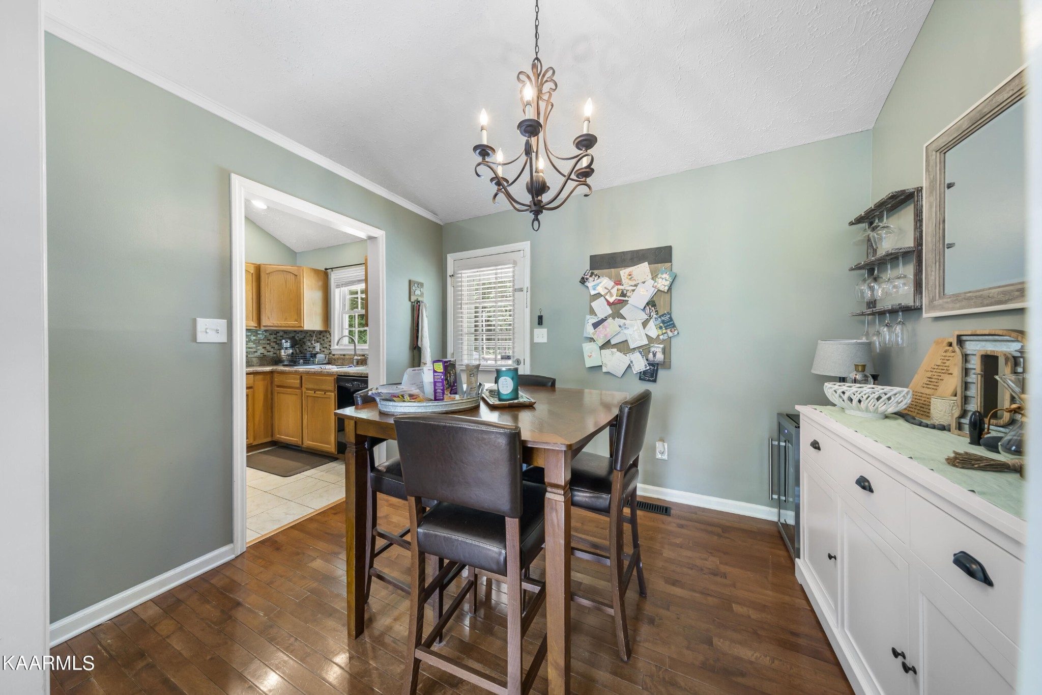 3909 Abercorn Road Knoxville, TN 37921 - Photo 5 of 18 a view of a dining room with furniture and chandelier