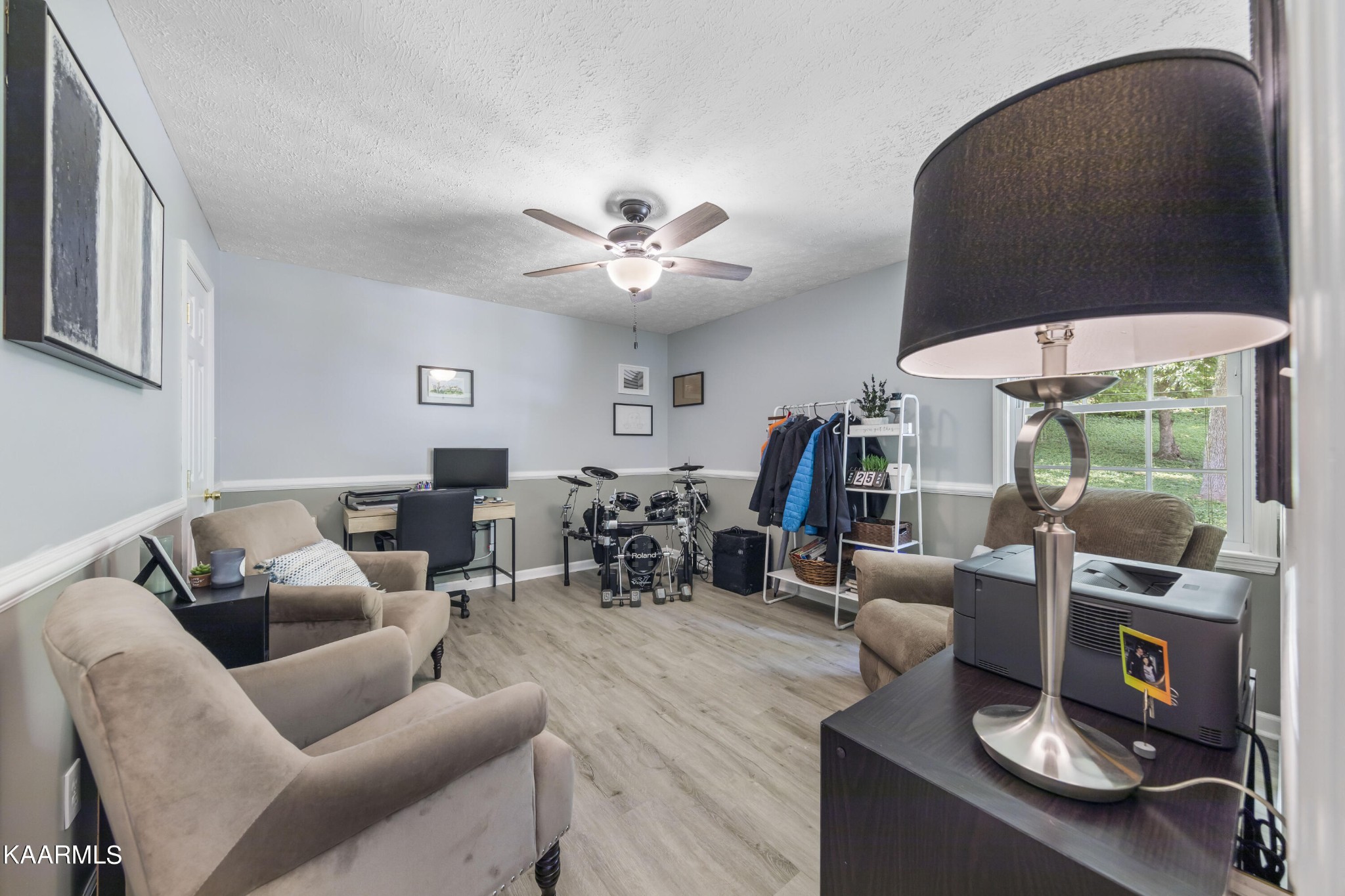 3909 Abercorn Road Knoxville, TN 37921 - Photo 10 of 18 a living room with furniture and wooden floor