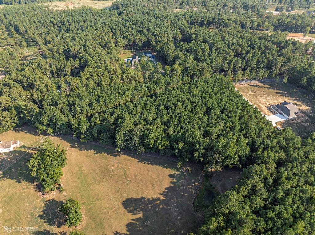 190 Linton Bellevue Road Benton, LA 71006 - Photo 7 of 13 Aerial overview of property's location with a heavily wooded area
