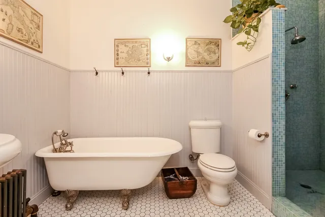 a living room with a couch and a rug