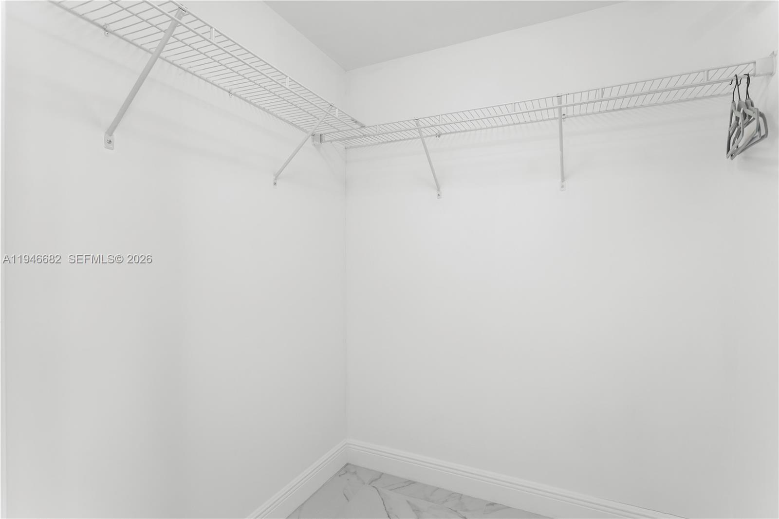 465 Brickell Avenue, Unit 5505 Miami, FL 33131 - Photo 20 of 25 a view of a room with racks on the wall
