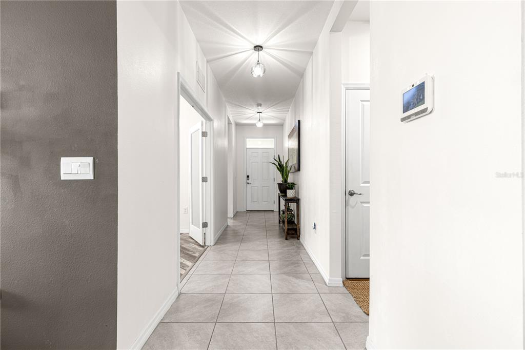 6233 Southwest 89th St Road Ocala, FL 34476 - Photo 25 of 39 a bathroom with a mirror and a shower
