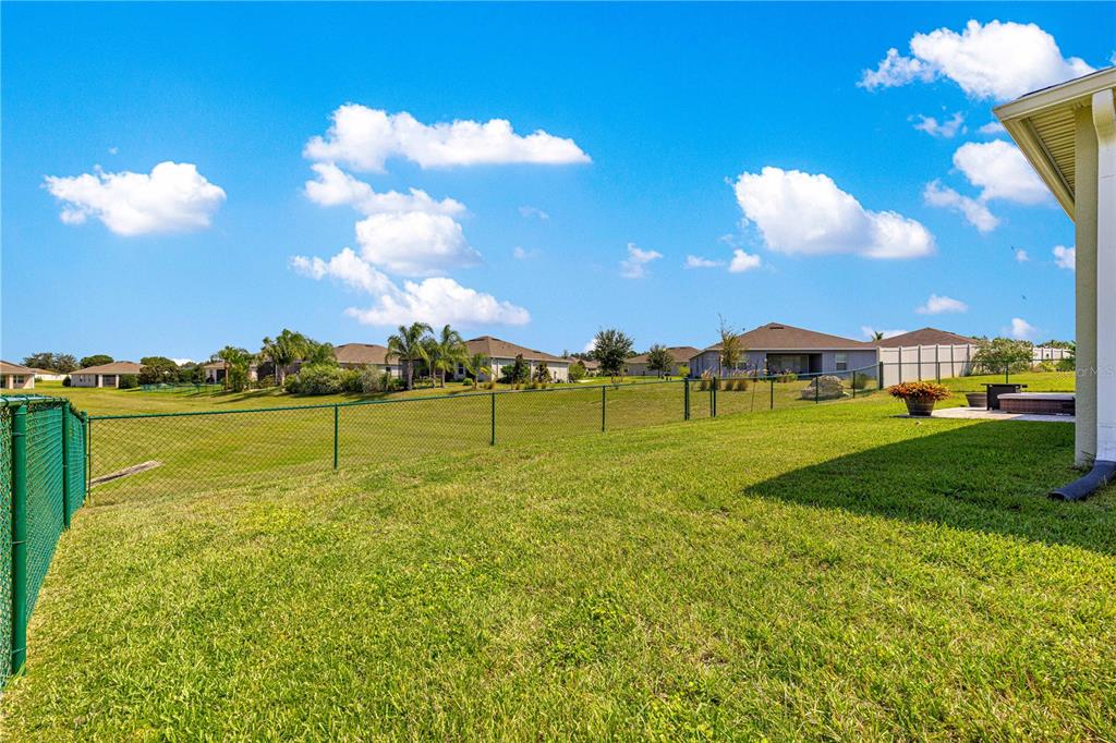 6233 Southwest 89th St Road Ocala, FL 34476 - Photo 34 of 39 a view of a golf course with a lake