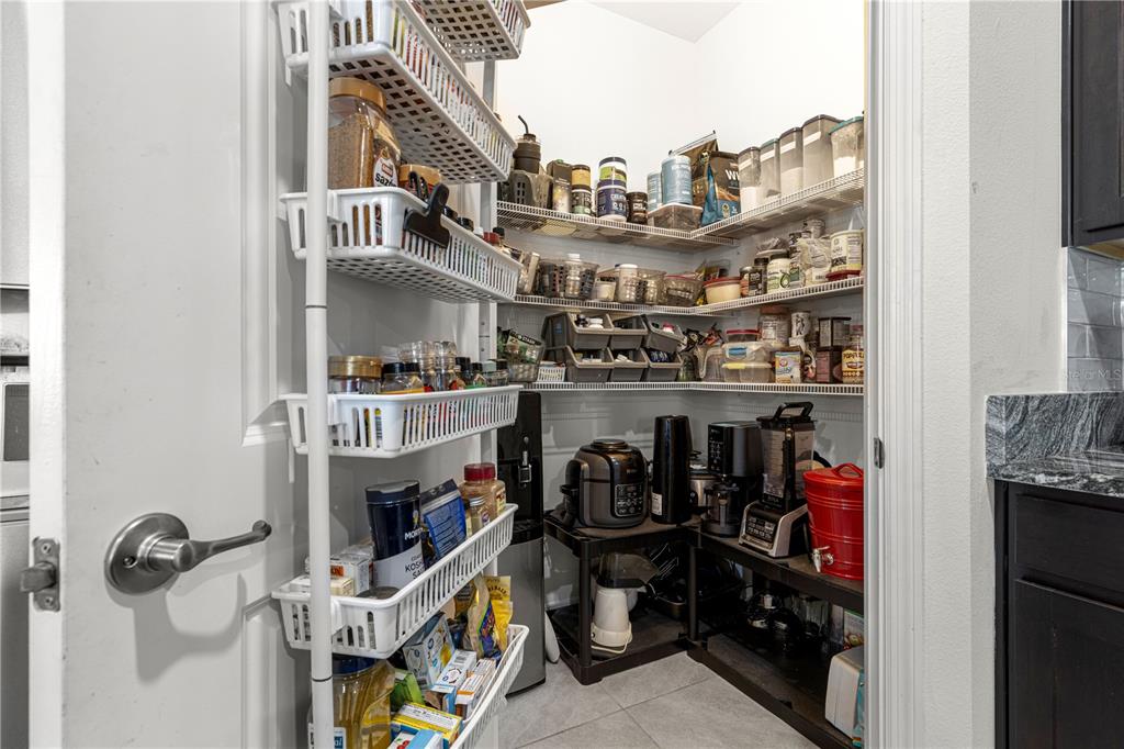 6233 Southwest 89th St Road Ocala, FL 34476 - Photo 8 of 39 a view of storage and utility room