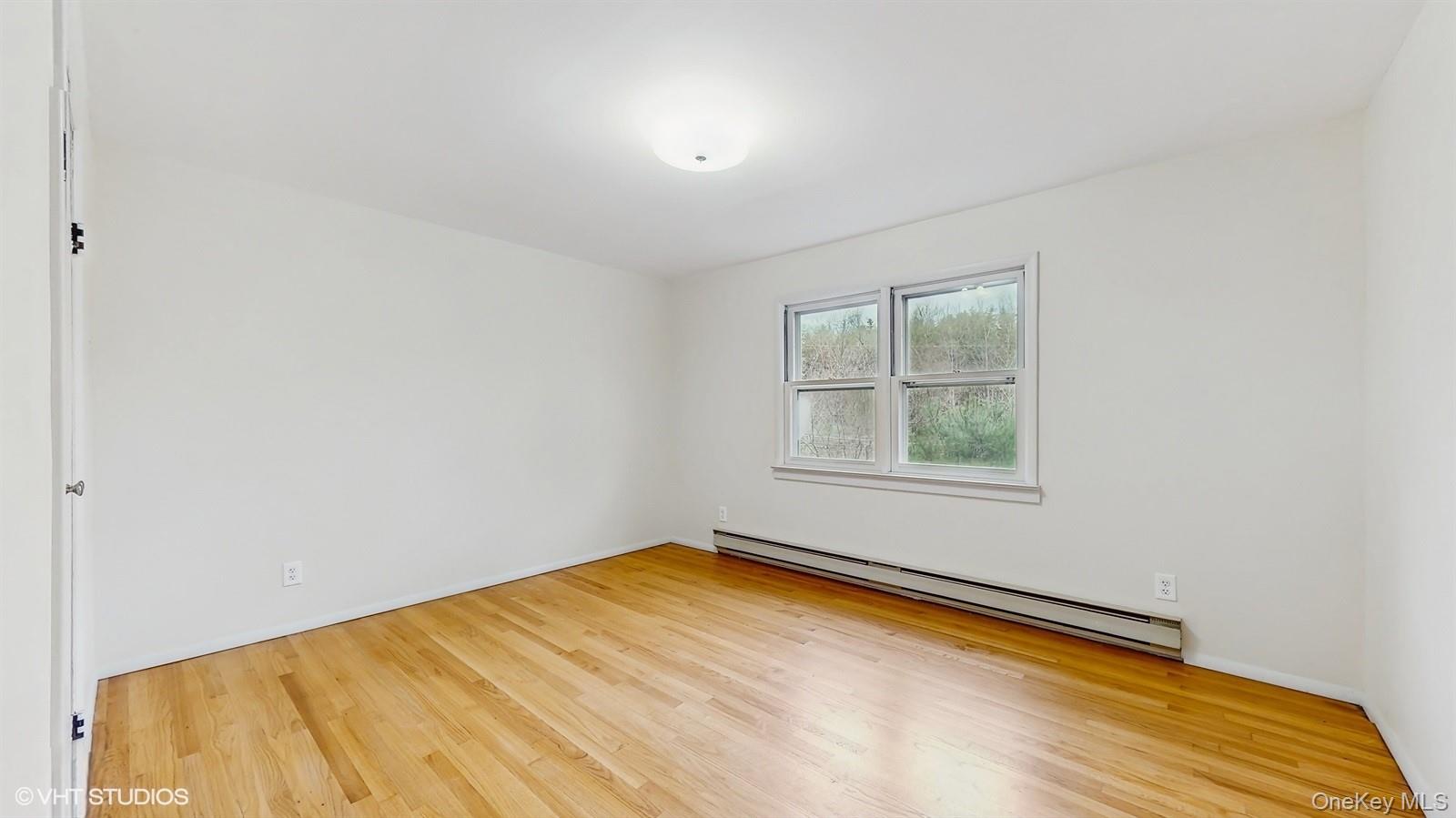 736 State Rte 55 Napanoch, NY 12458 - Photo 10 of 49 Primary room featuring wood finished floors
