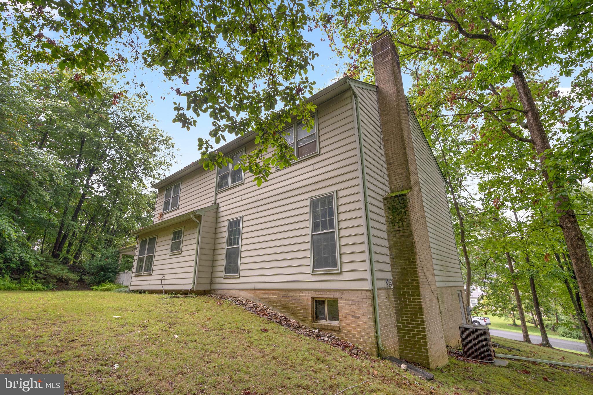 9509 Emory Grove Road Gaithersburg, MD 20877 - Photo 53 of 57 a view of a house with a yard
