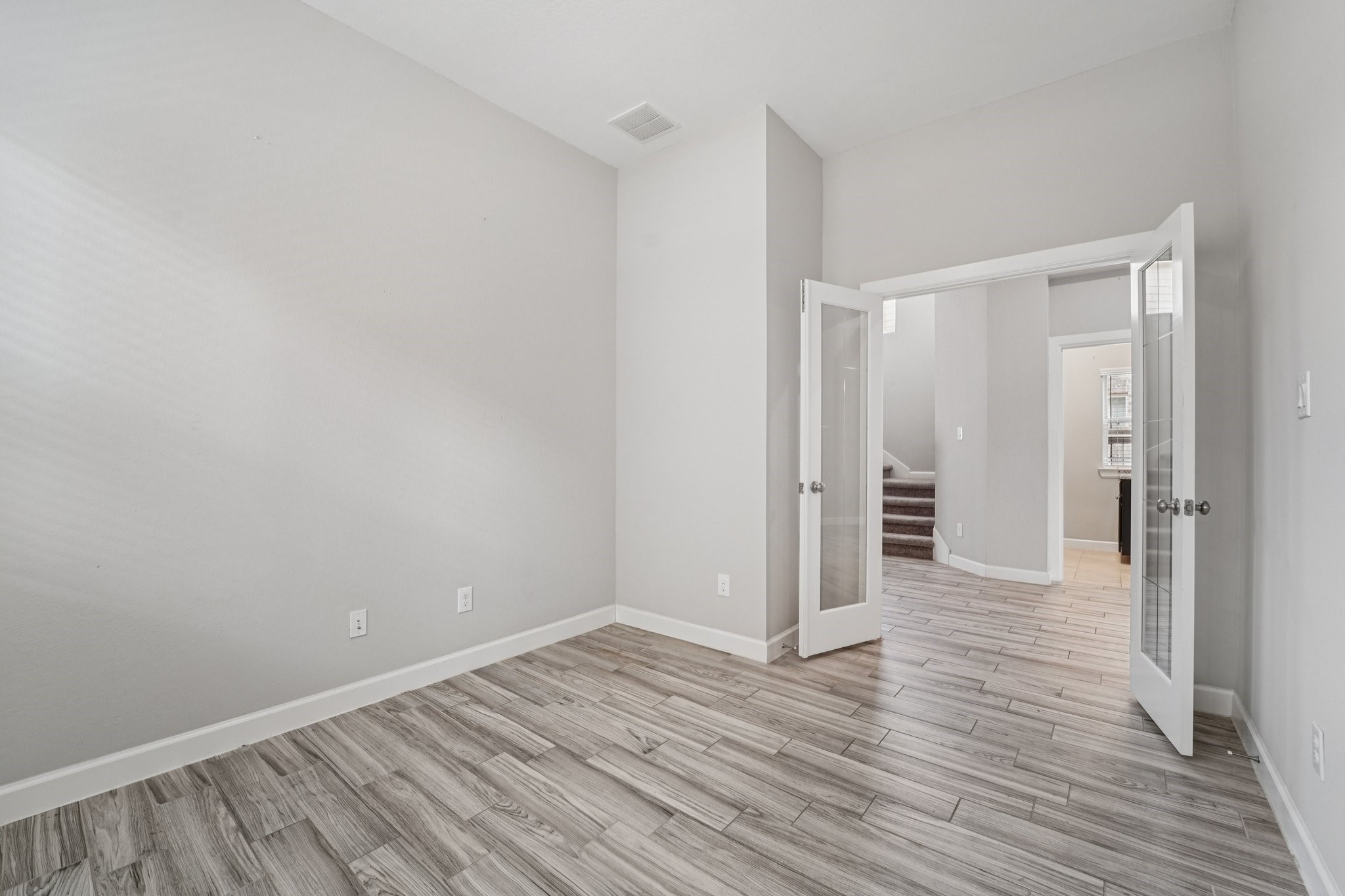 19751 Shinnery Ridge Court Cypress, TX 77433 - Photo 17 of 43 a view of a room with wooden floor