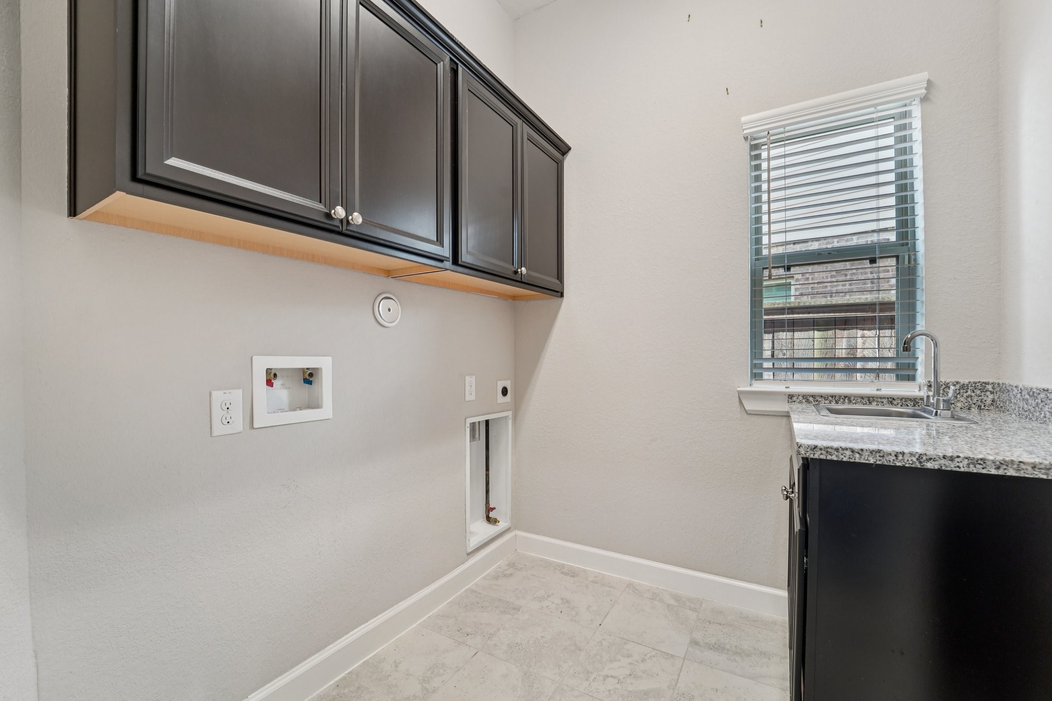 19751 Shinnery Ridge Court Cypress, TX 77433 - Photo 19 of 43 a view of cabinets and window