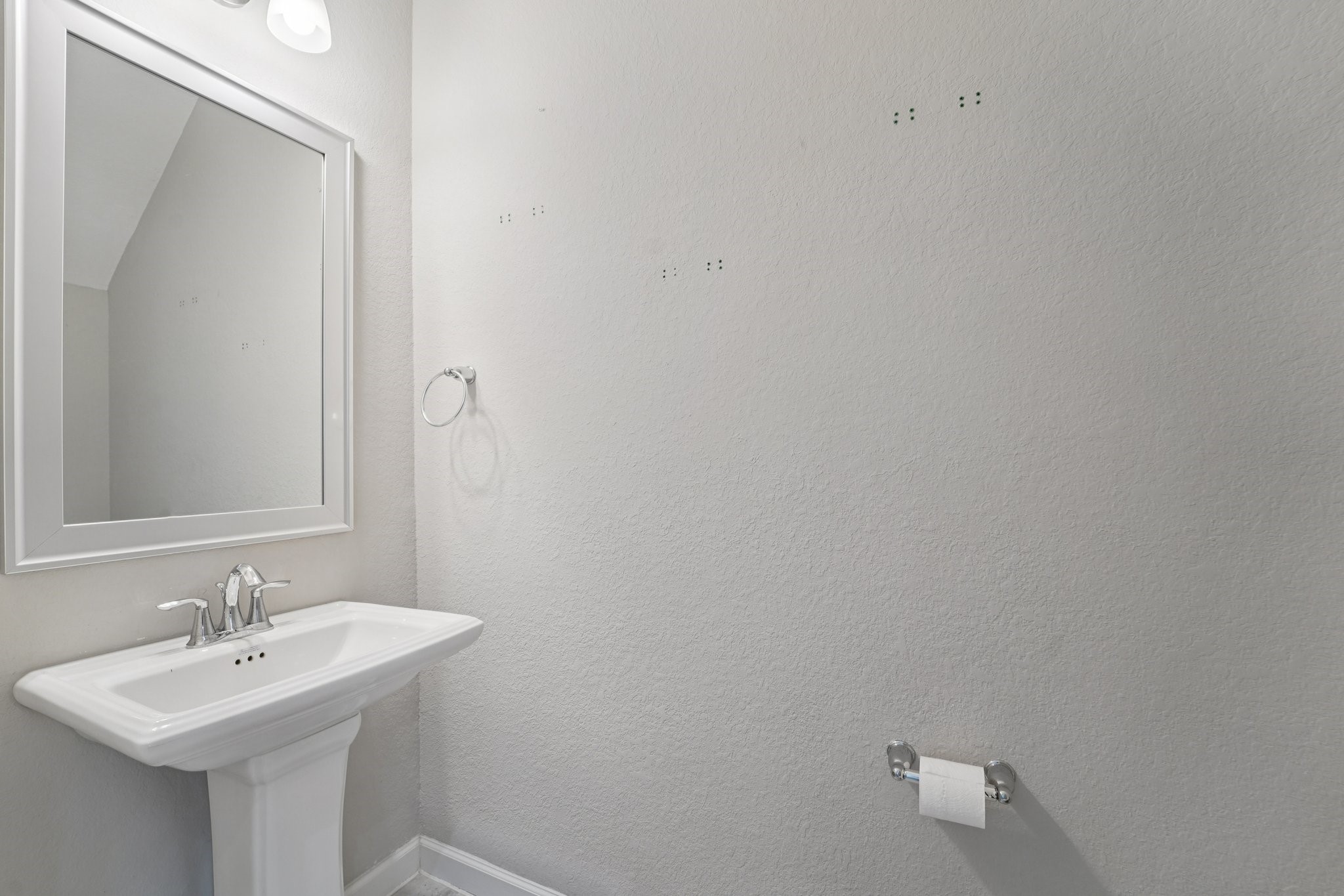 19751 Shinnery Ridge Court Cypress, TX 77433 - Photo 26 of 43 a bathroom with a sink and a mirror