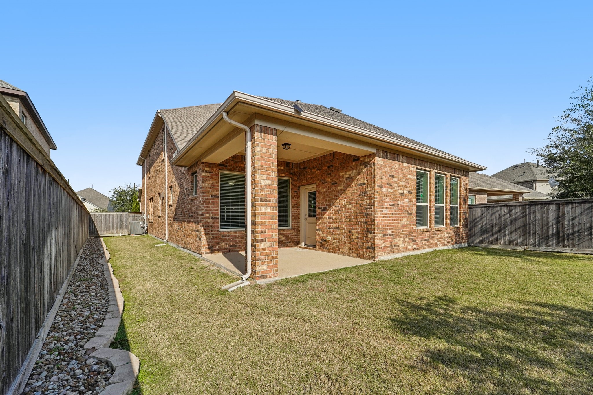 19751 Shinnery Ridge Court Cypress, TX 77433 - Photo 37 of 43 a view of a house with a yard