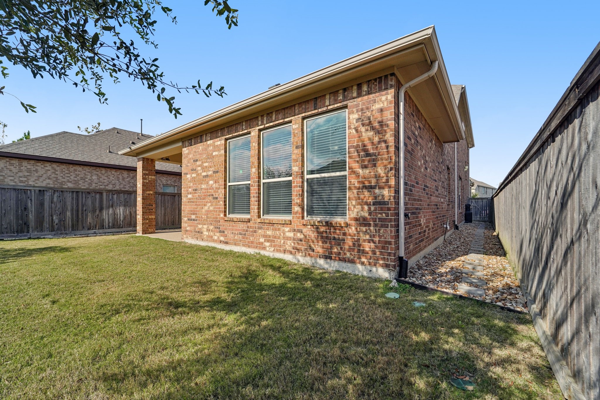 19751 Shinnery Ridge Court Cypress, TX 77433 - Photo 39 of 43 a view of a house with backyard and sitting area