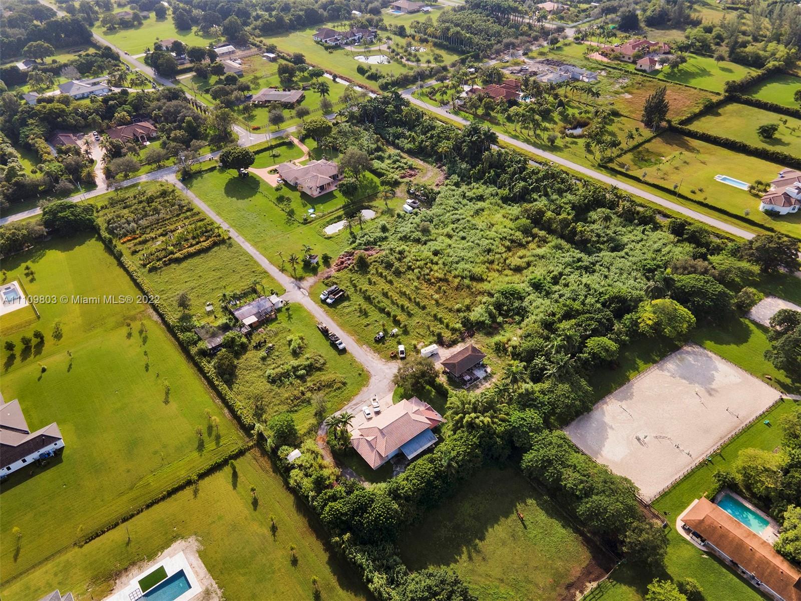 5879 Southwest 178th Avenue Southwest Ranches, FL 33331 - Photo 25 of 27 an aerial view of residential houses with outdoor space