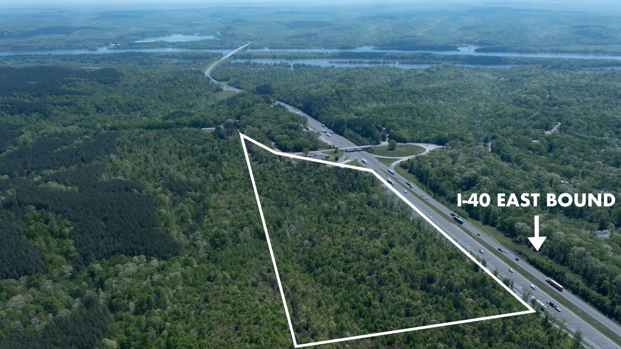 1 Birdsong Road East Holladay, TN 38341 - Photo 2 of 8 a view of a yard with a street