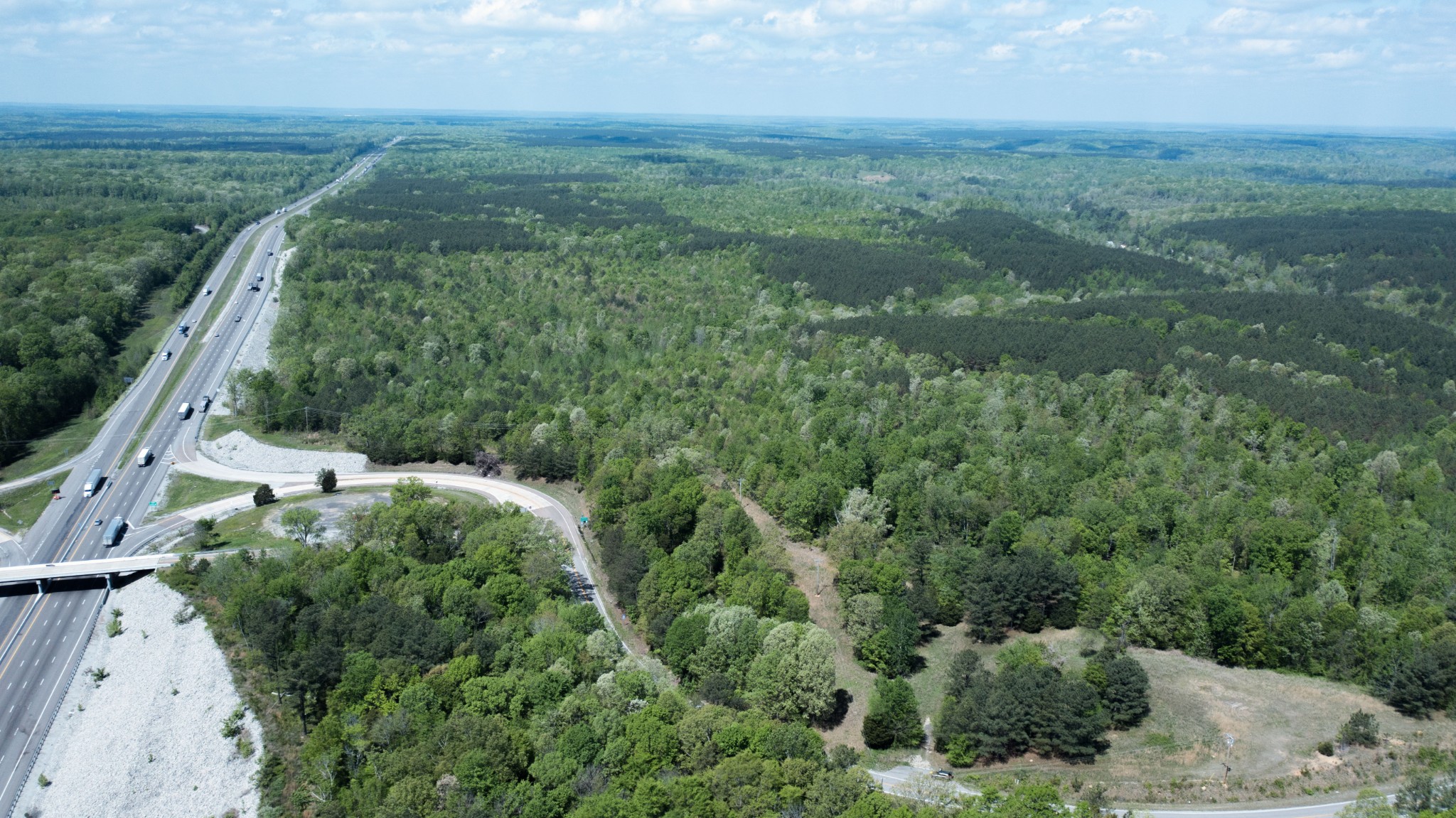 1 Birdsong Road East Holladay, TN 38341 - Photo 4 of 8 an aerial view of residential houses with outdoor space and trees