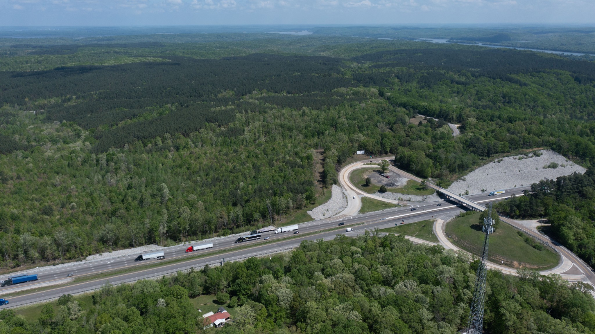 1 Birdsong Road East Holladay, TN 38341 - Photo 7 of 8 an aerial view of a house with a garden