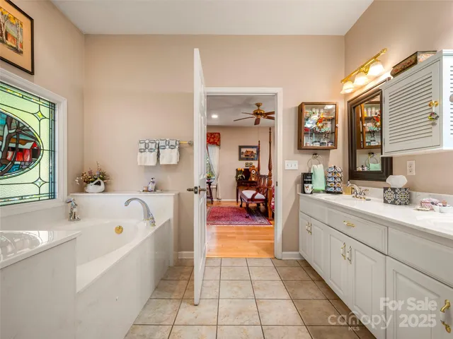 a view of a dining room with furniture and kitchen view