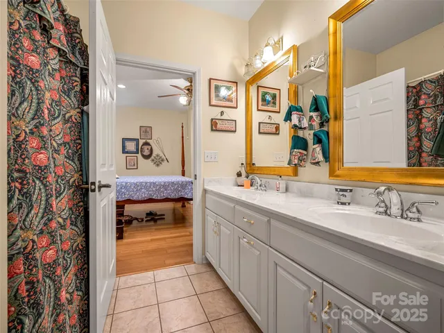 a bedroom with a bed and a table in it