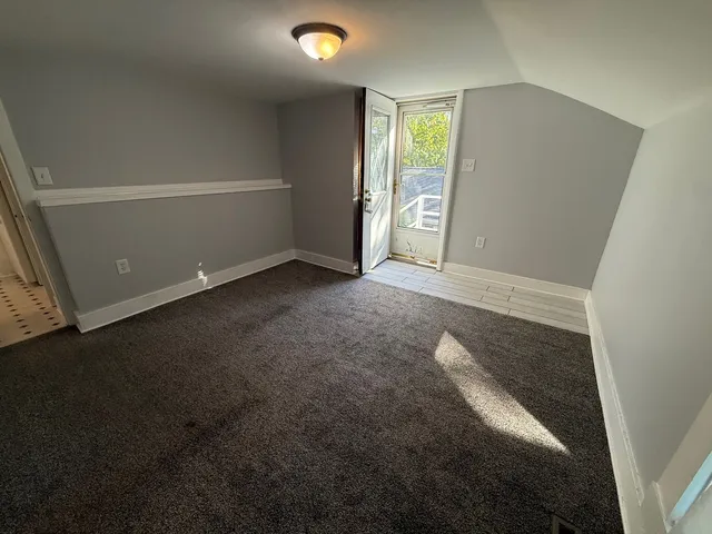 a kitchen with sink a microwave a stove and refrigerator