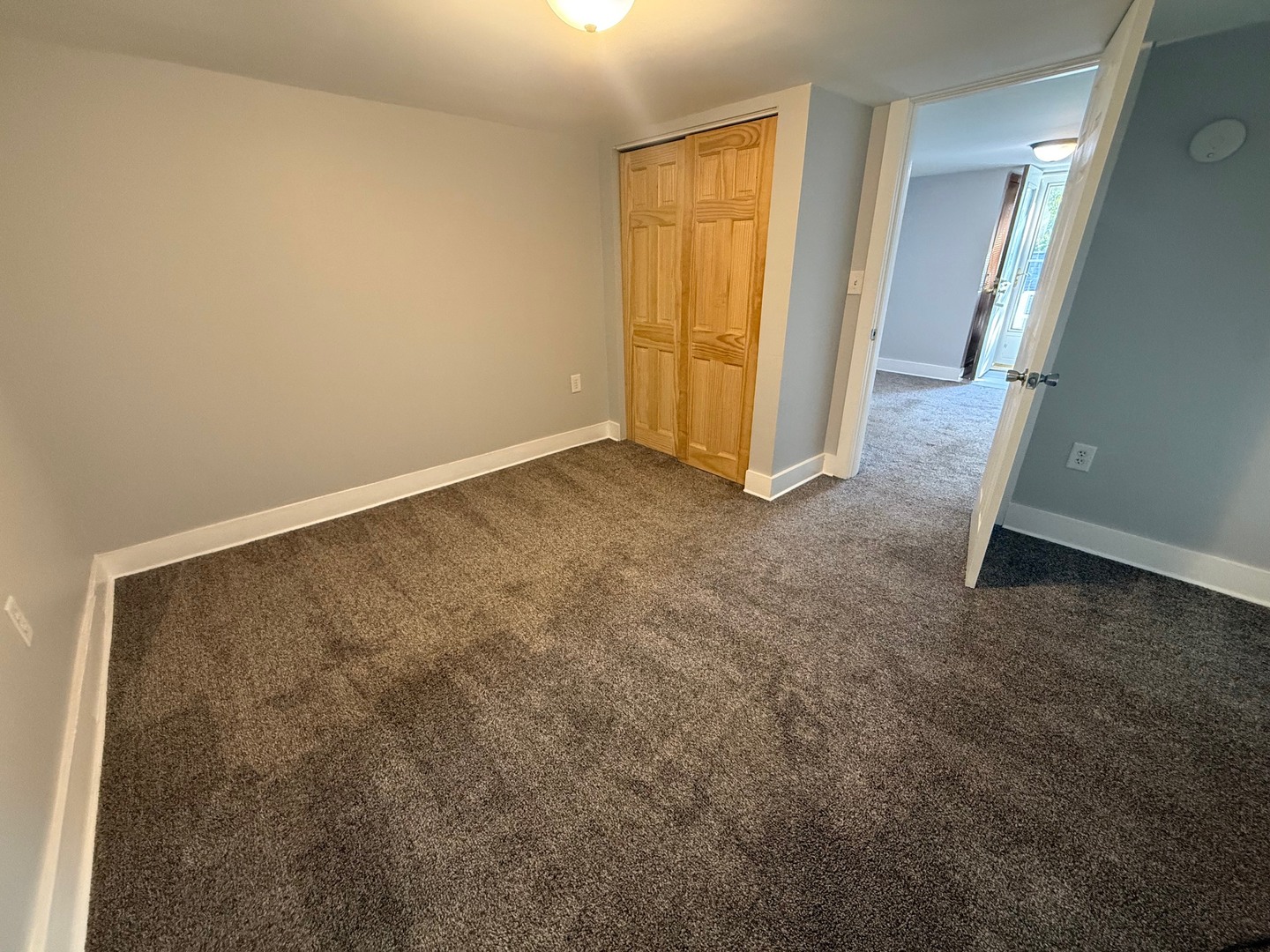 326 1/2 South Walnut Street Sycamore, IL 60178 - Photo 7 of 10 an empty room with closet