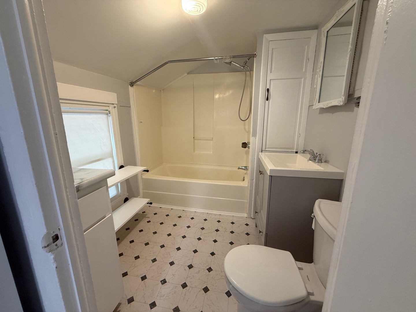 326 1/2 South Walnut Street Sycamore, IL 60178 - Photo 10 of 10 a bathroom with a sink toilet and shower