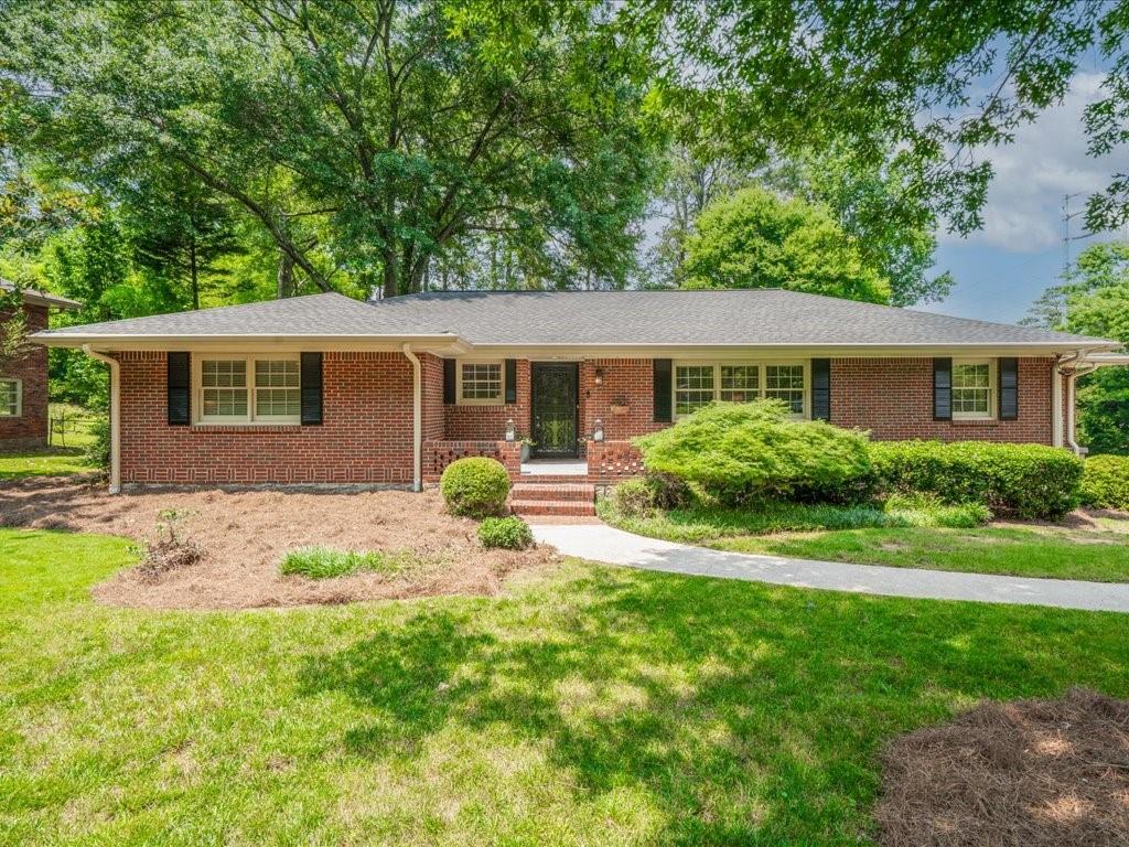 2178 Tanglewood Road Decatur, GA 30033 - Photo 1 of 1 a view of a house with a backyard