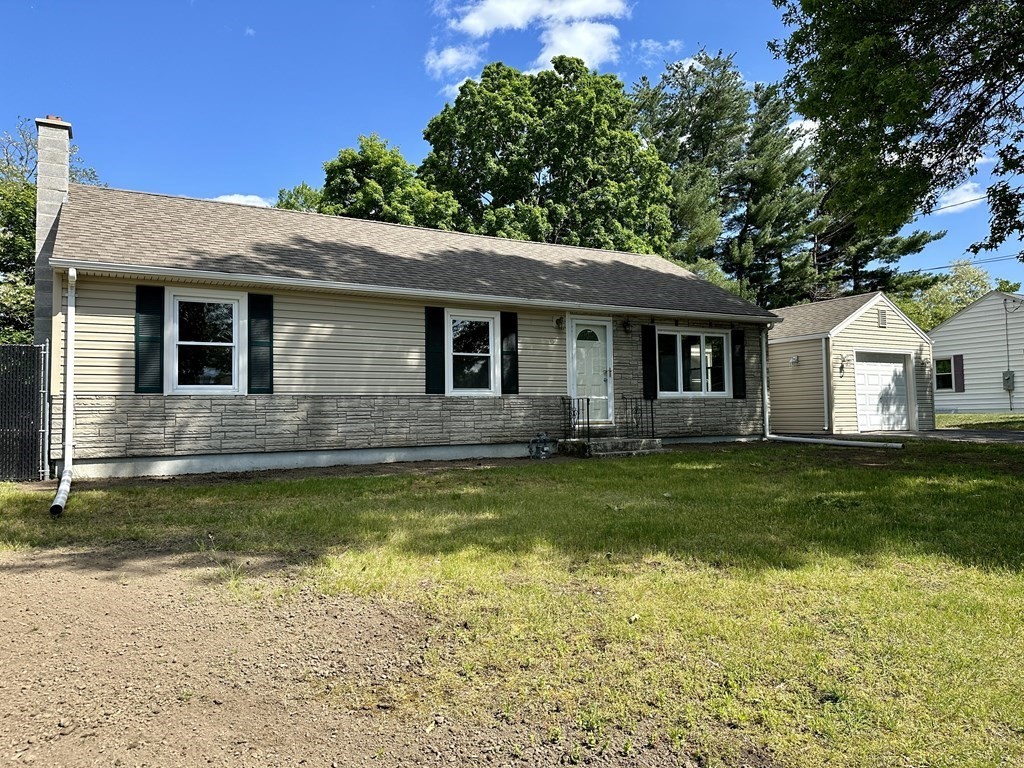 5 Wilshire Road Springfield, MA 01118 - Photo 3 of 40 a view of a house with a swimming pool