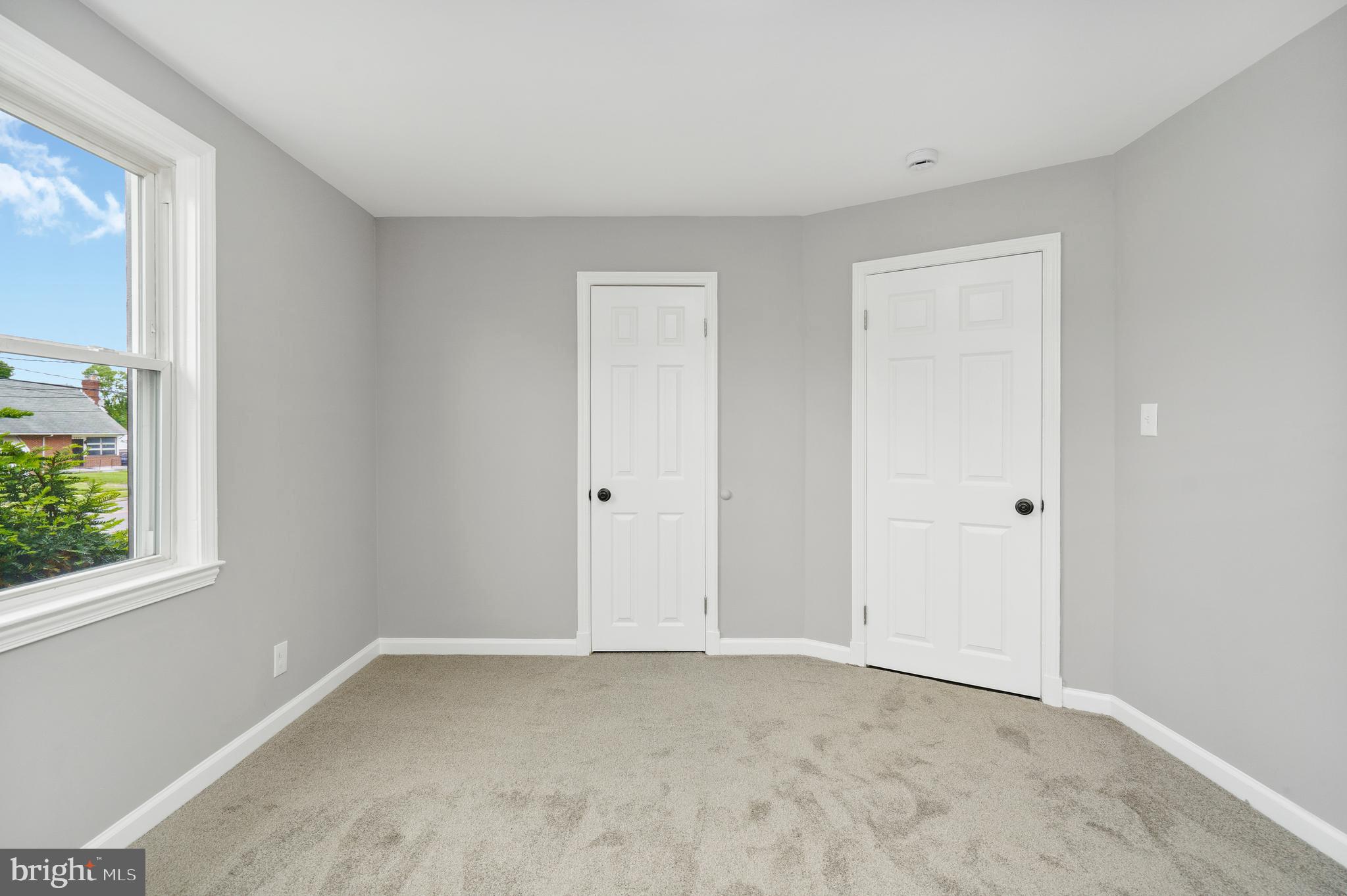 3531 Milford Mill Road Baltimore, MD 21244 - Photo 22 of 49 a view of an empty room and a window