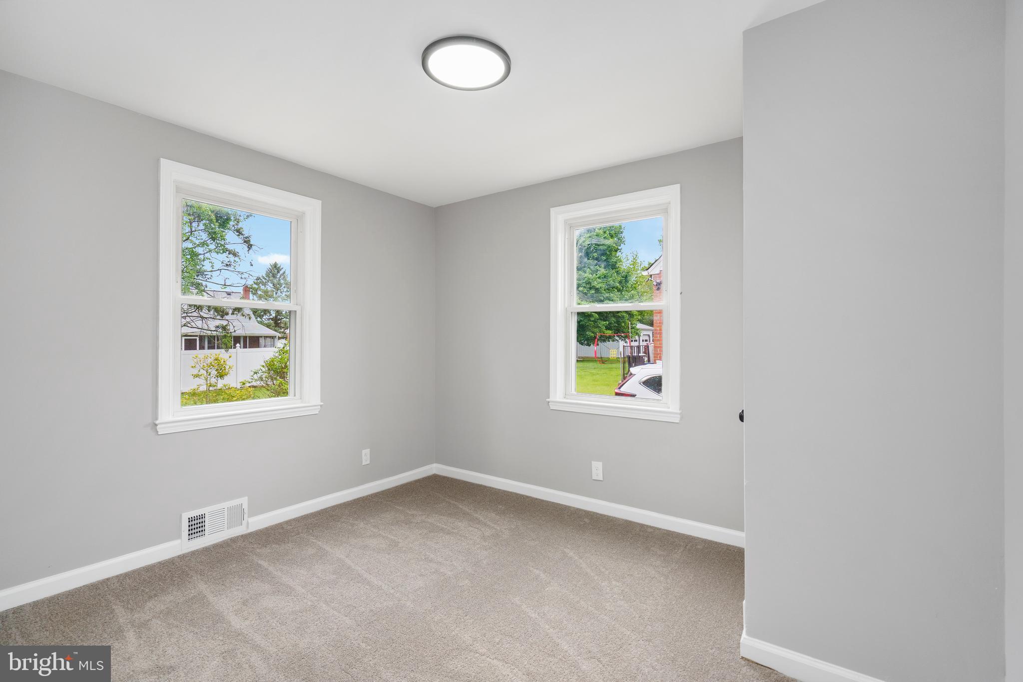 3531 Milford Mill Road Baltimore, MD 21244 - Photo 24 of 49 an empty room with windows