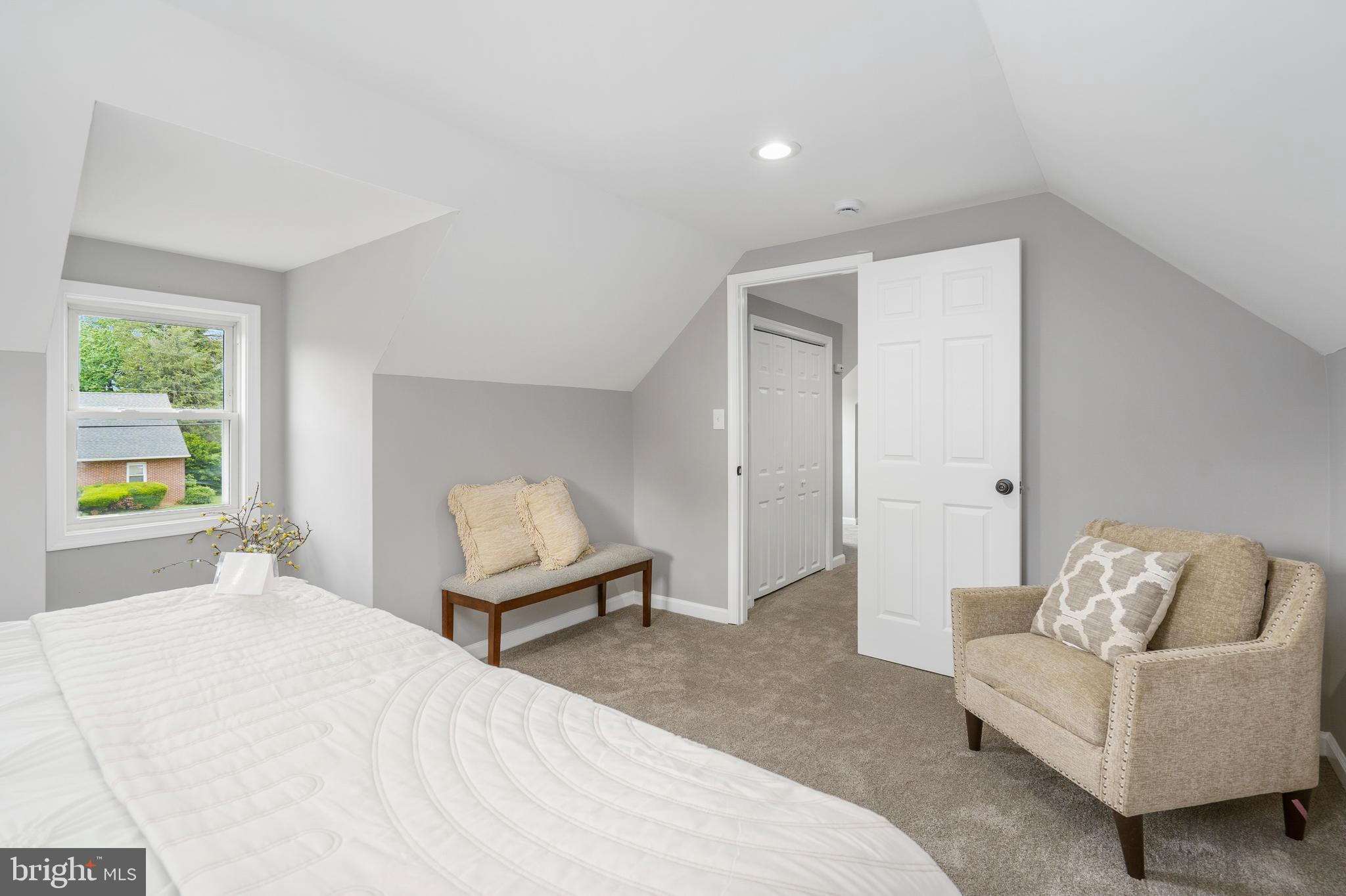 3531 Milford Mill Road Baltimore, MD 21244 - Photo 33 of 49 a bedroom with a bed and a couch