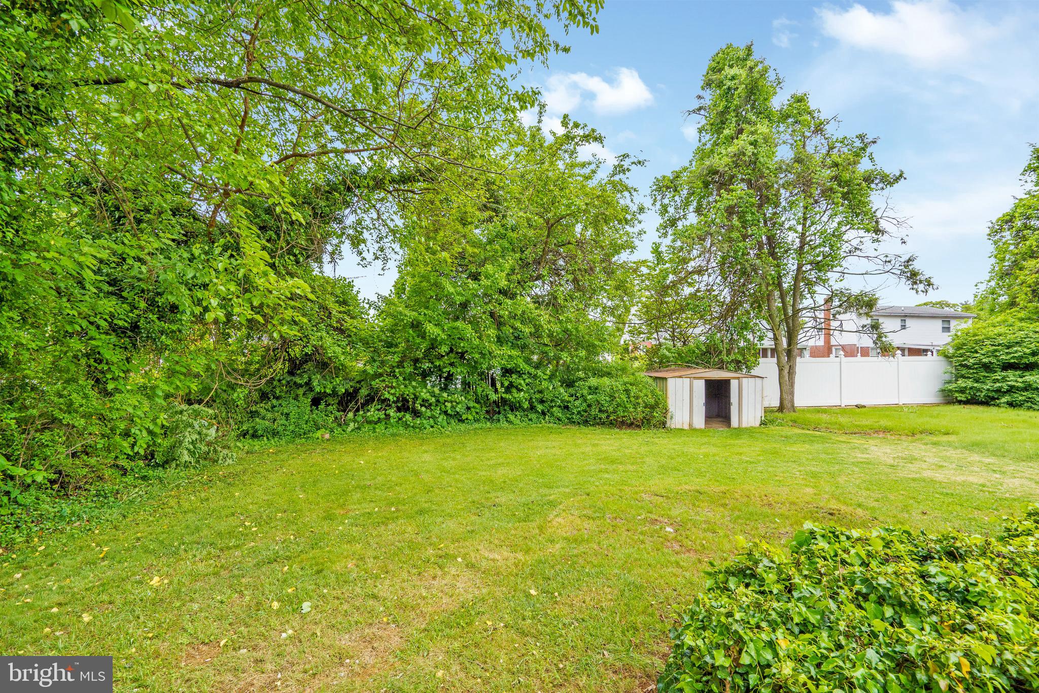 3531 Milford Mill Road Baltimore, MD 21244 - Photo 45 of 49 a view of a garden with a house