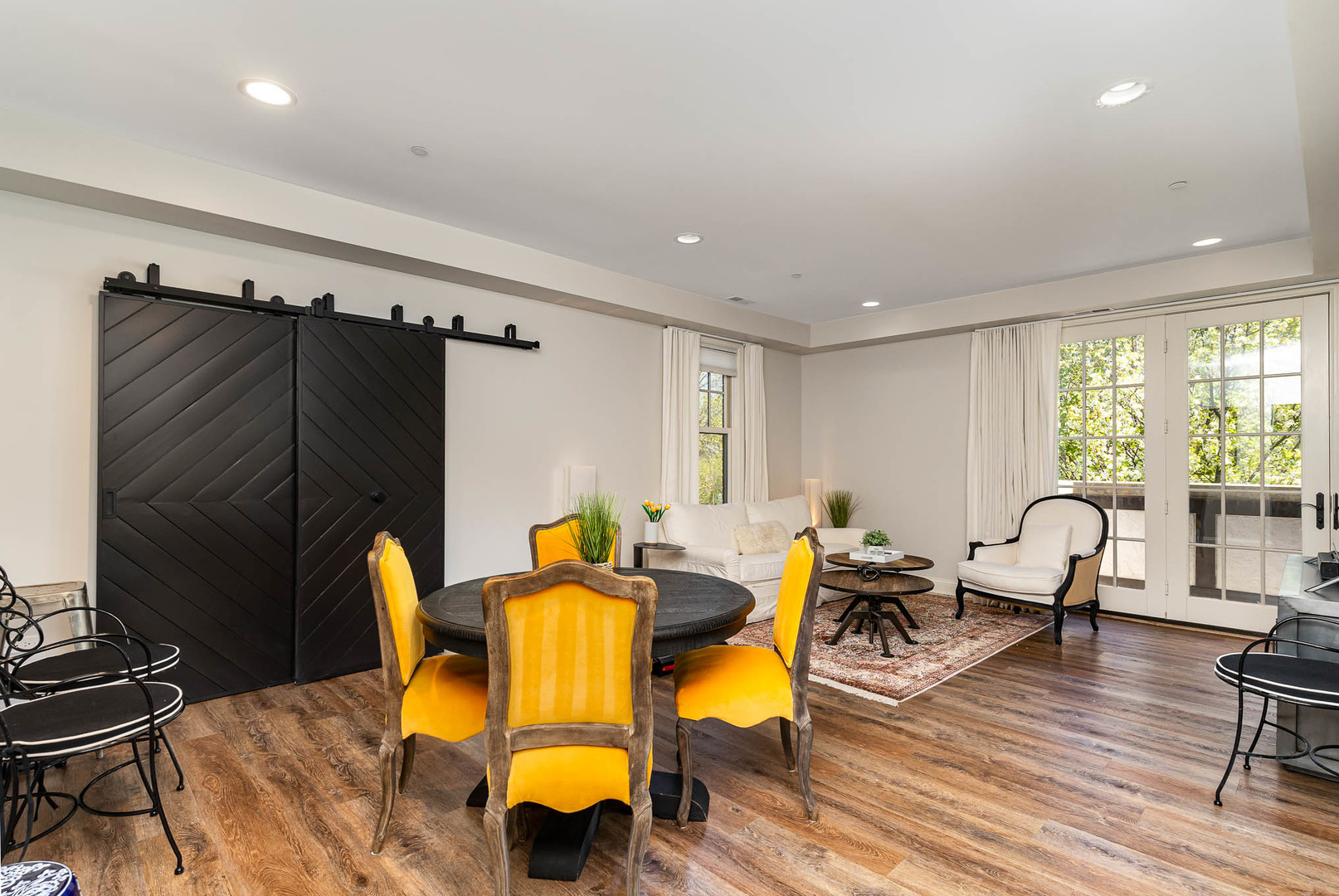 720 Green Bay Road, Unit 2E Winnetka, IL 60093 - Photo 3 of 13 a living room with furniture and a wooden floor