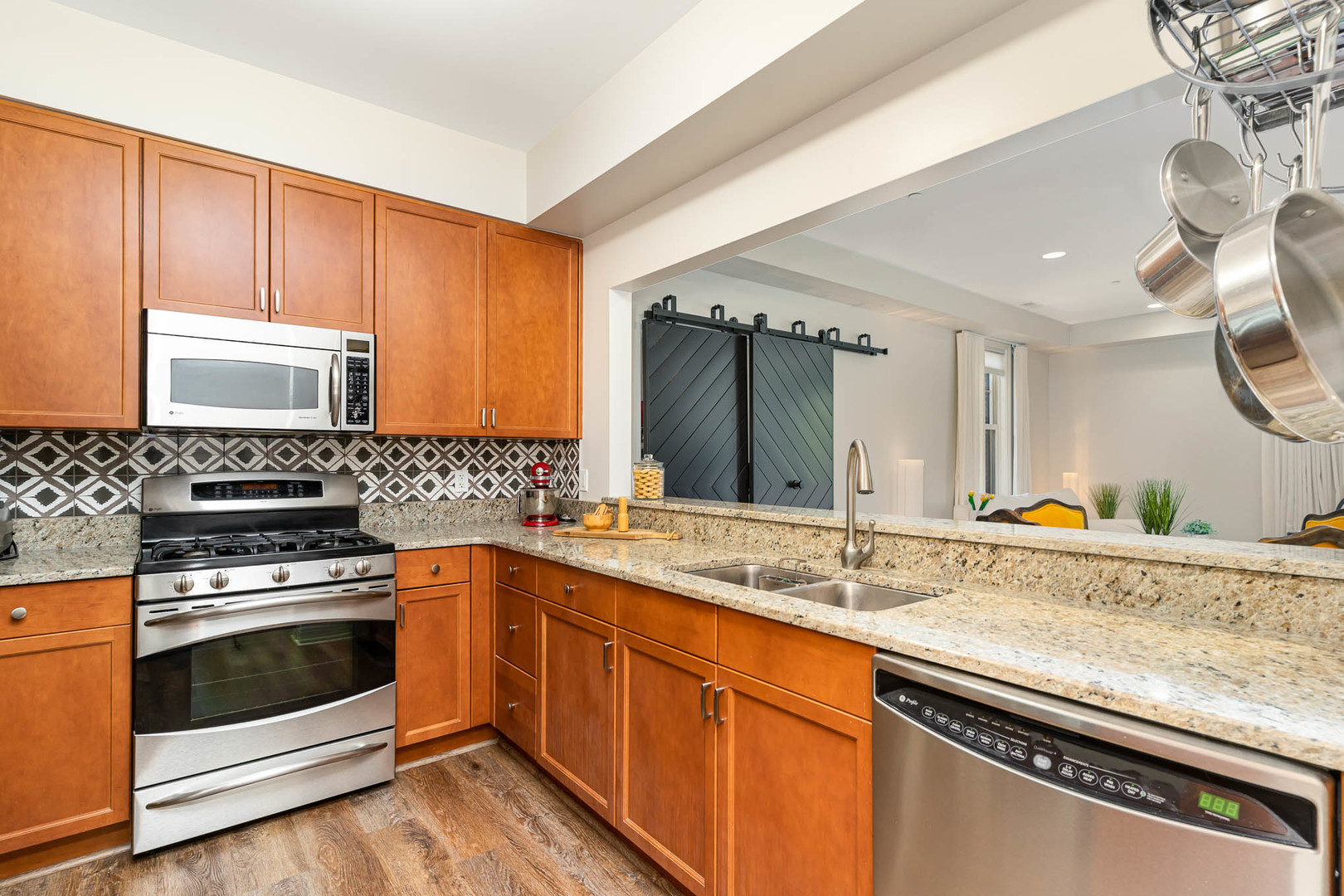 720 Green Bay Road, Unit 2E Winnetka, IL 60093 - Photo 4 of 13 a kitchen with a sink stove and cabinets