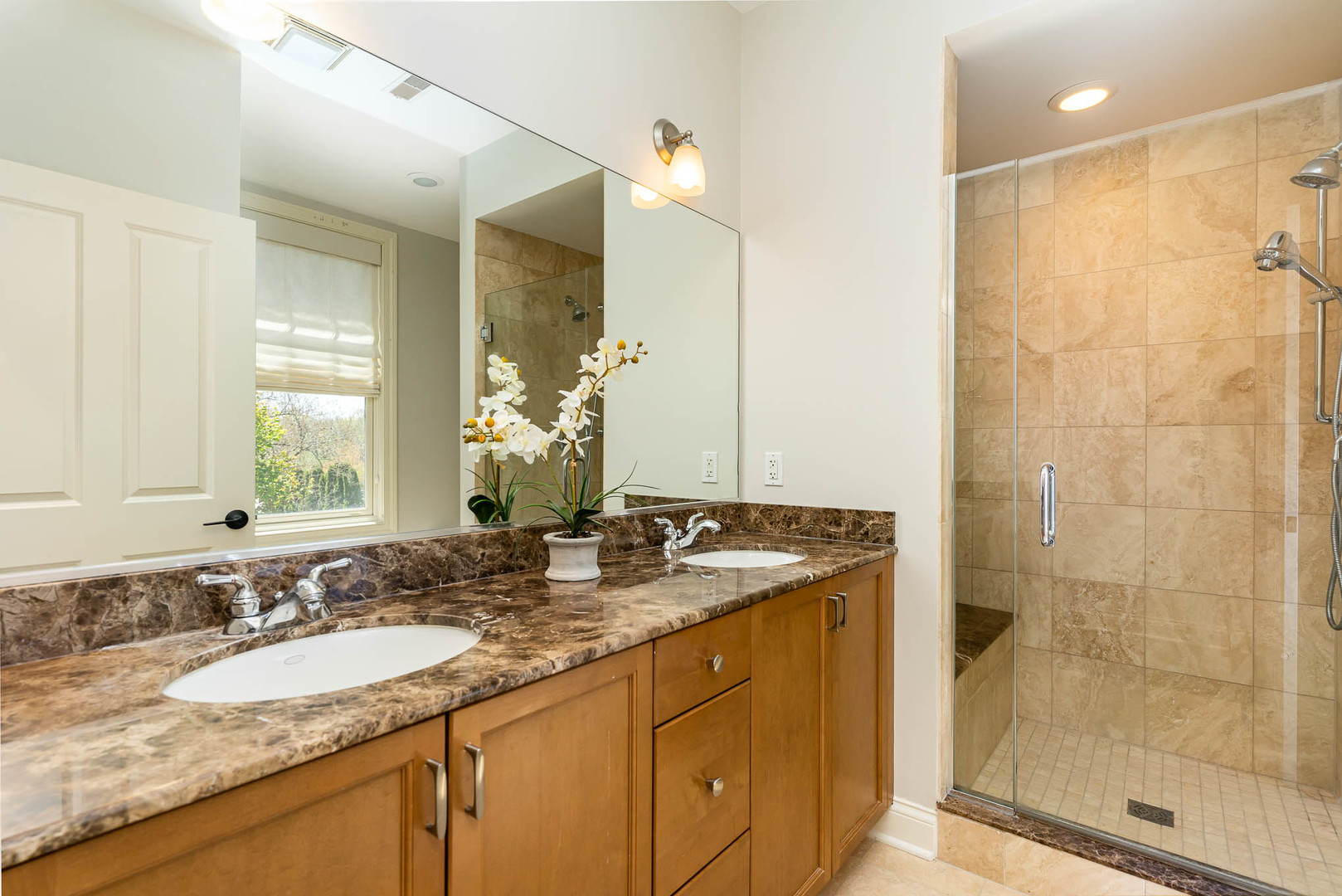 720 Green Bay Road, Unit 2E Winnetka, IL 60093 - Photo 10 of 13 a bathroom with a granite countertop sink and a mirror