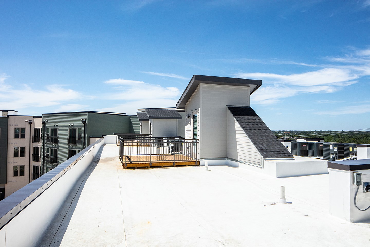 3100 Scofield Ridge Parkway, Unit 1217 Austin, TX 78727 - Photo 21 of 21 Rear view of property featuring a balcony and roof with shingles